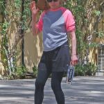 Kim Basinger in a Straw Hat Leaves Her Workout in Los Angeles