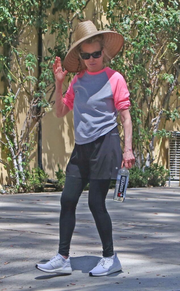 Kim Basinger in a Straw Hat