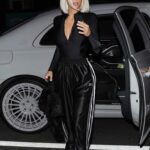 Kim Kardashian in a Black Track Pants Arrives for Dinner at Giorgio Baldi in Santa Monica