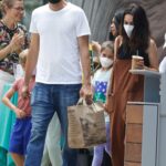 Mila Kunis in a White Sneakers Goes Shopping with Ashton Kutcher at Erewhon Market in Studio City