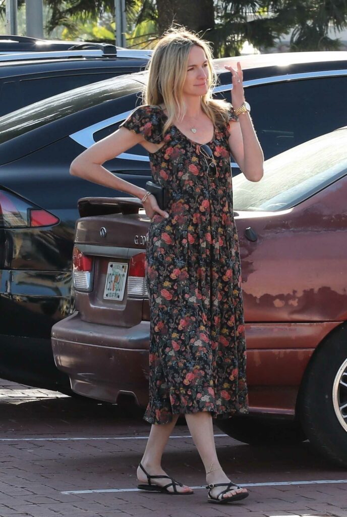 Molly McNearney in a Floral Dress