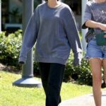 Naomi Scott in a Grey Sweatshirt Was Seen Out with Husband Jordan Spence in Cairns