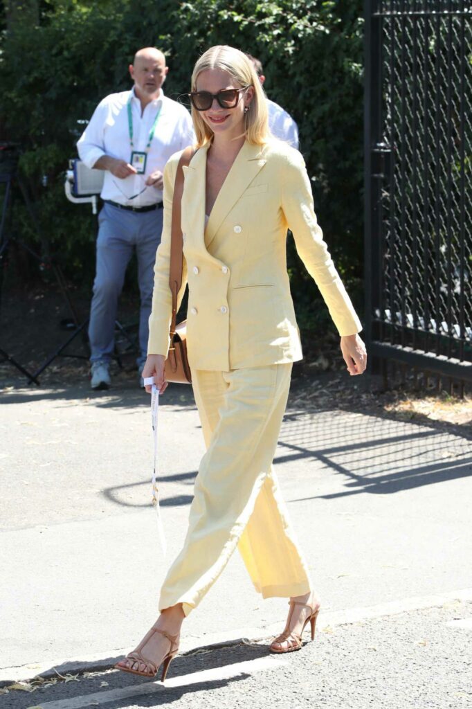 Poppy Delevingne in a Yellow Pantsuit