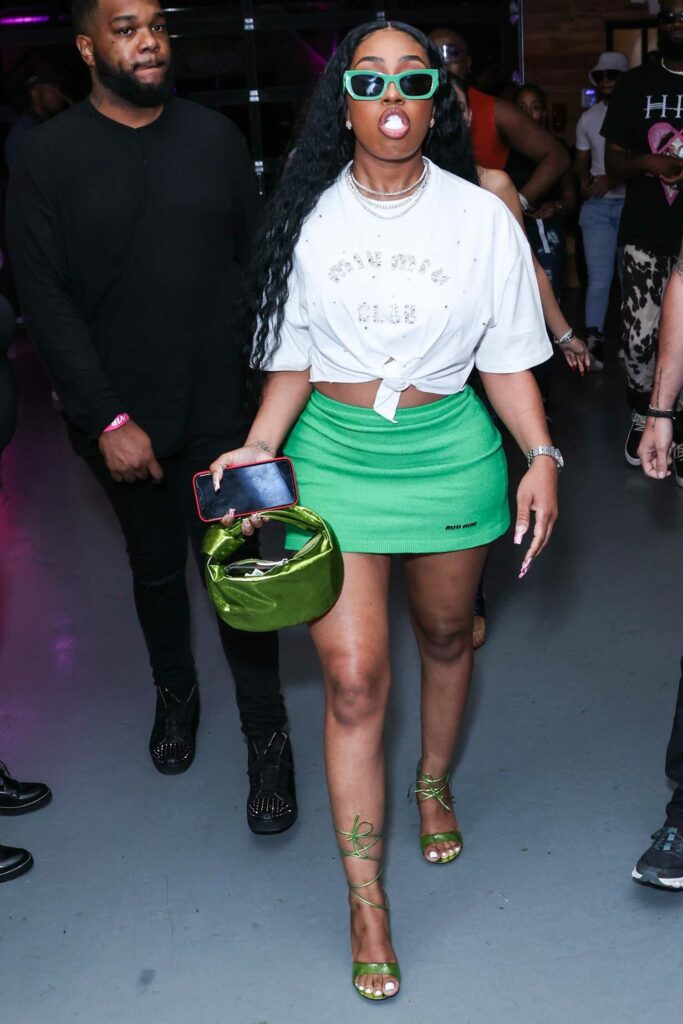 Yung Miami in a Green Mini Skirt
