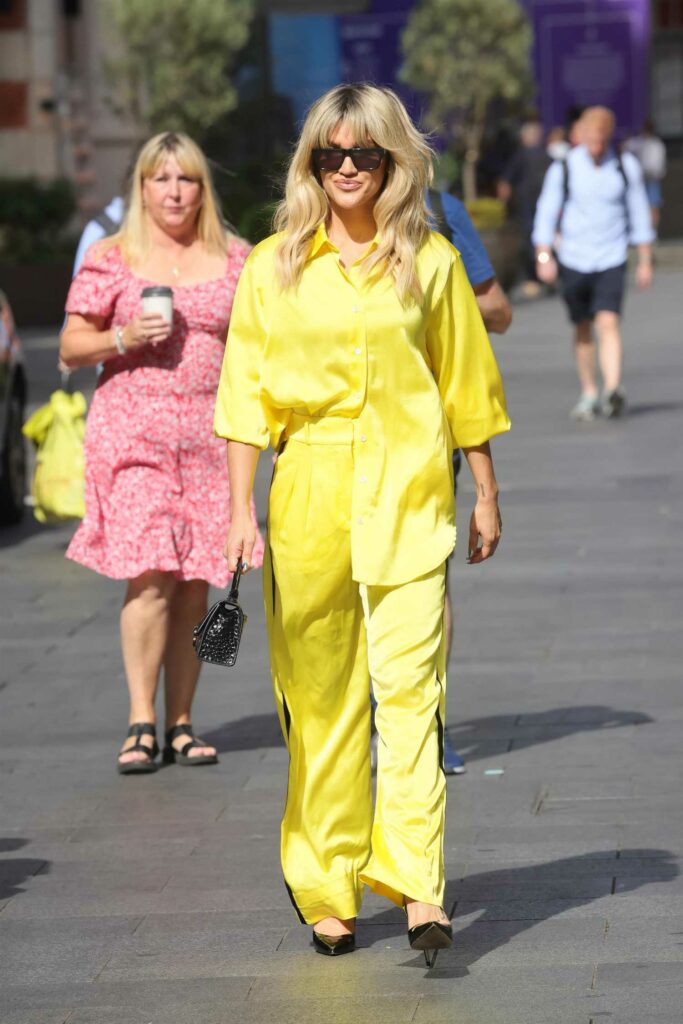 Ashley Roberts in a Yellow Pantsuit