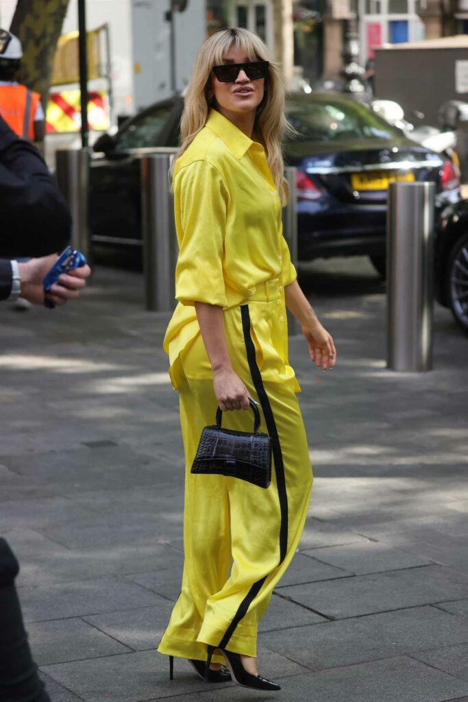 Ashley Roberts in a Yellow Pantsuit