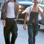 Bella Hadid in a Denim Ensemble Arrives at The US Open Out with  Marc Kalman in New York