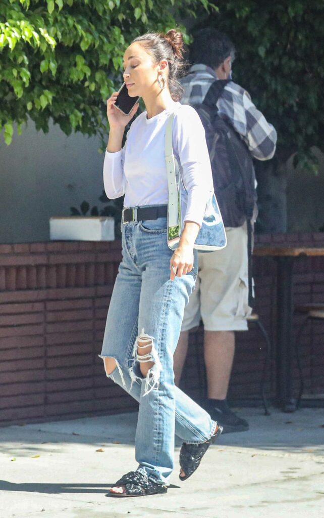 Cara Santana in a Blue Ripped Jeans