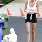 Emma Hernan in a White Top Walks Her  Labrador Retriever in Los Angeles
