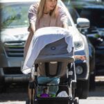 Jessica Hart in a White Cap Goes for a Walk with Her Son Hart Kirkham in Hollywood