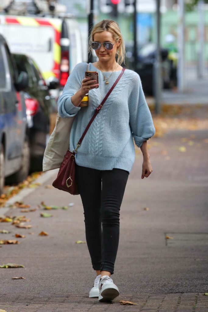Laura Whitmore in a Blue Sweater