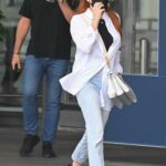 Lindsay Lohan in a White Shirt Arrives at JFK Airport in New York