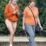 Megan Barton Hanson in a White Sneakers Was Seen Out with Her Mum in a Park in Essex