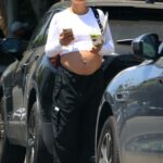 Shanina Shaik in a White Top Leaves the SEV Skin Care Clinic on Melrose Place in West Hollywood
