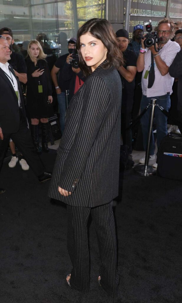Alexandra Daddario in a Striped Black Pantsuit