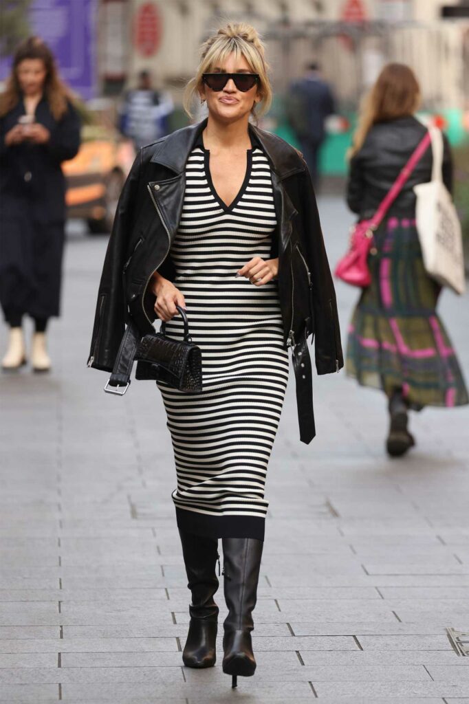 Ashley Roberts in a Black and White Striped Dress