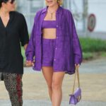 Florence Pugh in a Purple Ensemble Arrives at Venice Airport During the 79th Venice International Film Festival in Venice