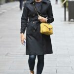 Jenni Falconer in a Black Trench Coat Leaves the Global Studios in London