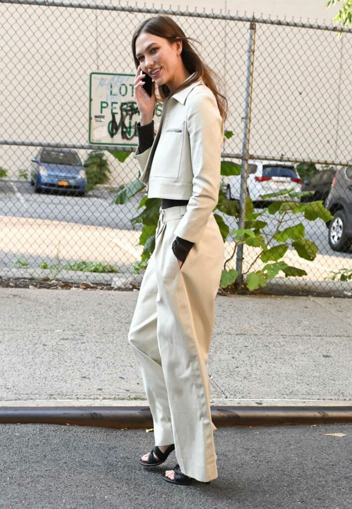Karlie Kloss in a White Pantsuit