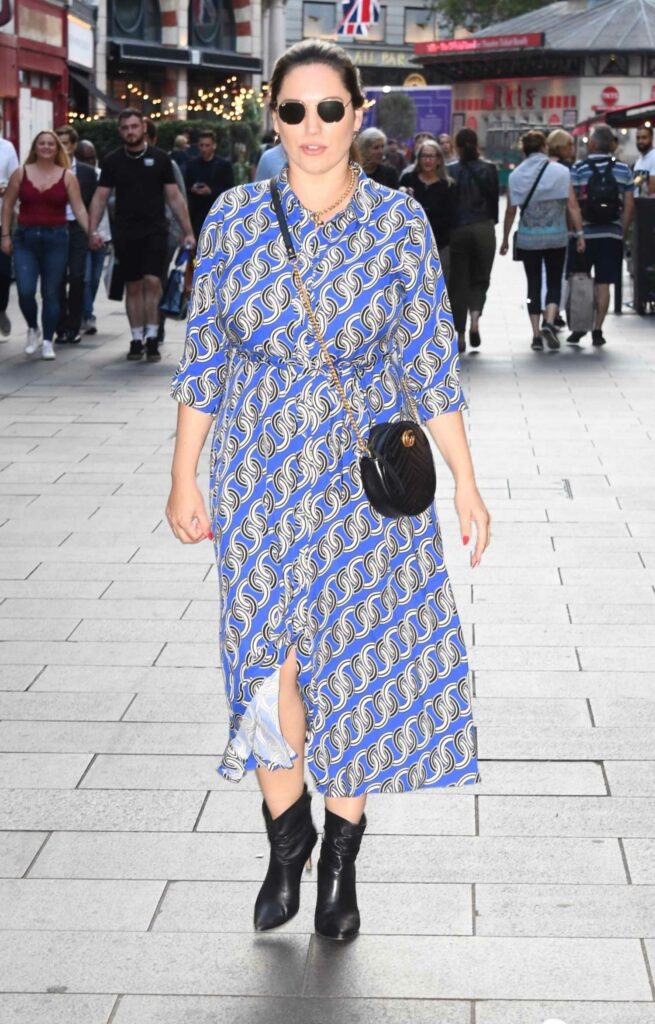 Kelly Brook in a Blue Patterned Dress
