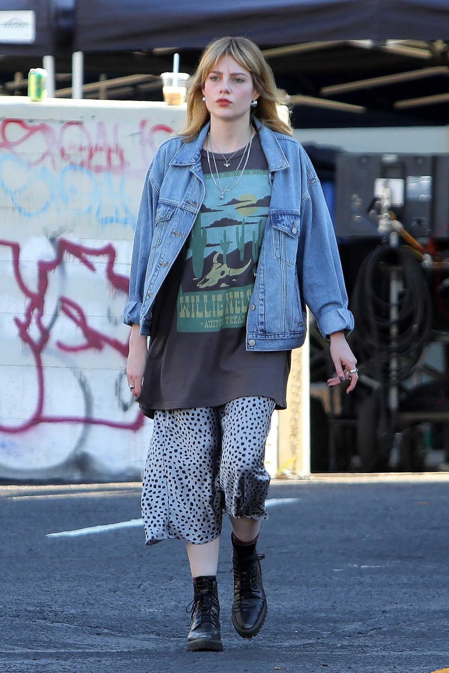 Lucy Boynton in a Blue Denim Jacket on the Set of The Greatest Hits in