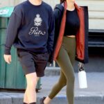 Nina Dobrev in an Olive Leggings Goes Shopping Out with Shaun White in Soho in NYC