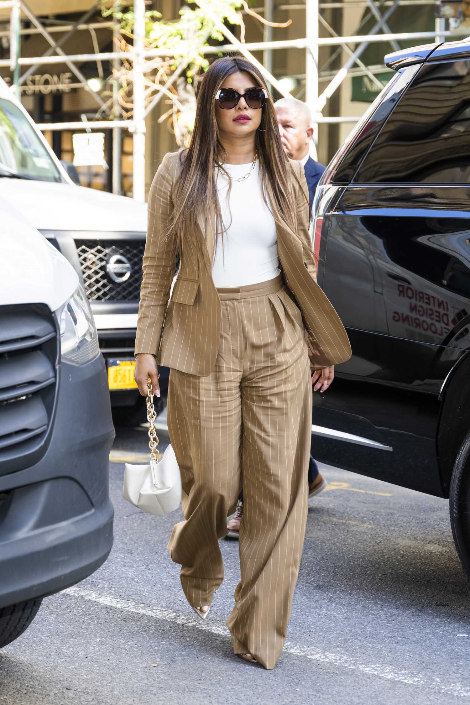 Priyanka Chopra in a Striped Beige Pantsuit Heads to Lunch in New York