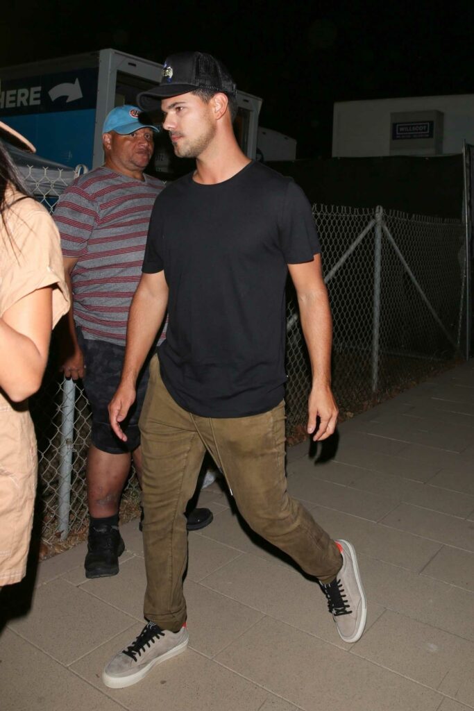 Taylor Lautner in a Black Tee