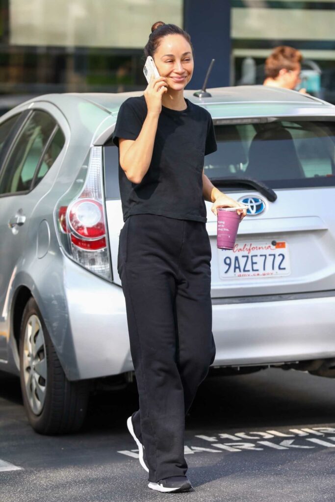 in a Black Tee Stops at EarthBar in Los Angeles 10/07/2022
