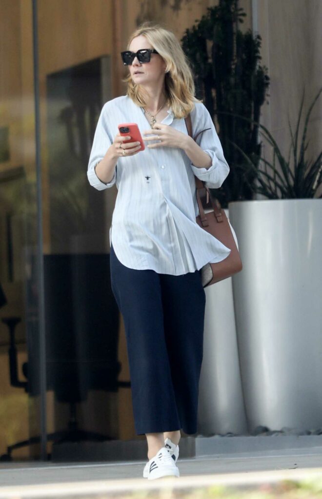 Carey Mulligan in a White Adidas Sneakers