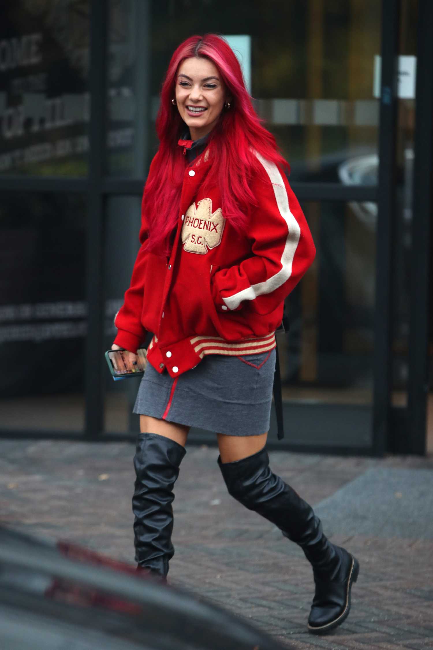 Dianne Buswell In A Red Jacket Leaves Her Hotel In London – Celeb Donut