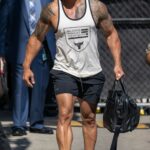 Dwayne Johnson in a White Tank Top Arrives at Jimmy Kimmel Live! Studios in Los Angeles