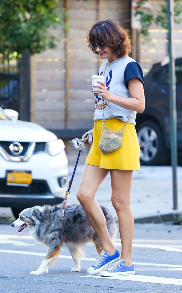 Helena Christensen in a Yellow Shorts