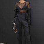 Lori Harvey Attends the Valentino Fashion Show During 2022 Paris Fashion Week in Paris