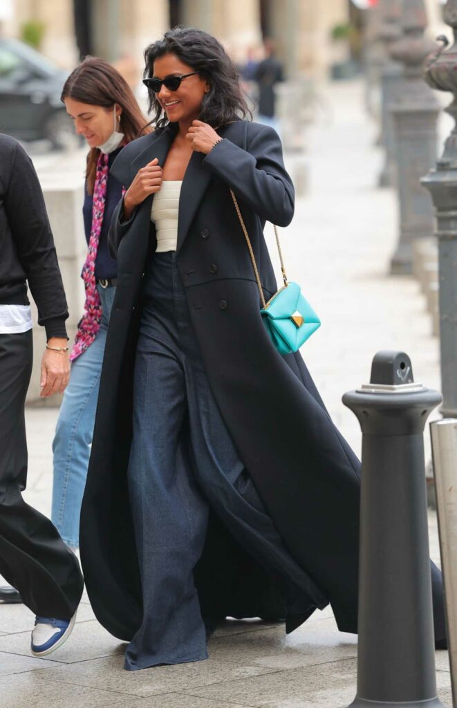 Simone Ashley in a Black Coat