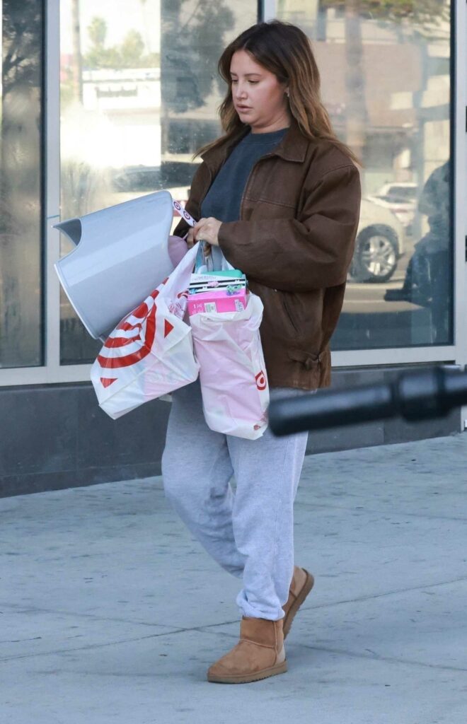 Ashley Tisdale in a Grey Sweatpants