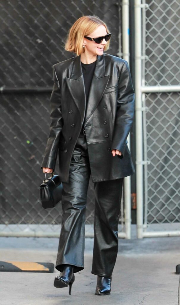 Carey Mulligan in a Black Leather Pantsuit