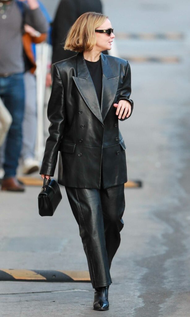 Carey Mulligan in a Black Leather Pantsuit