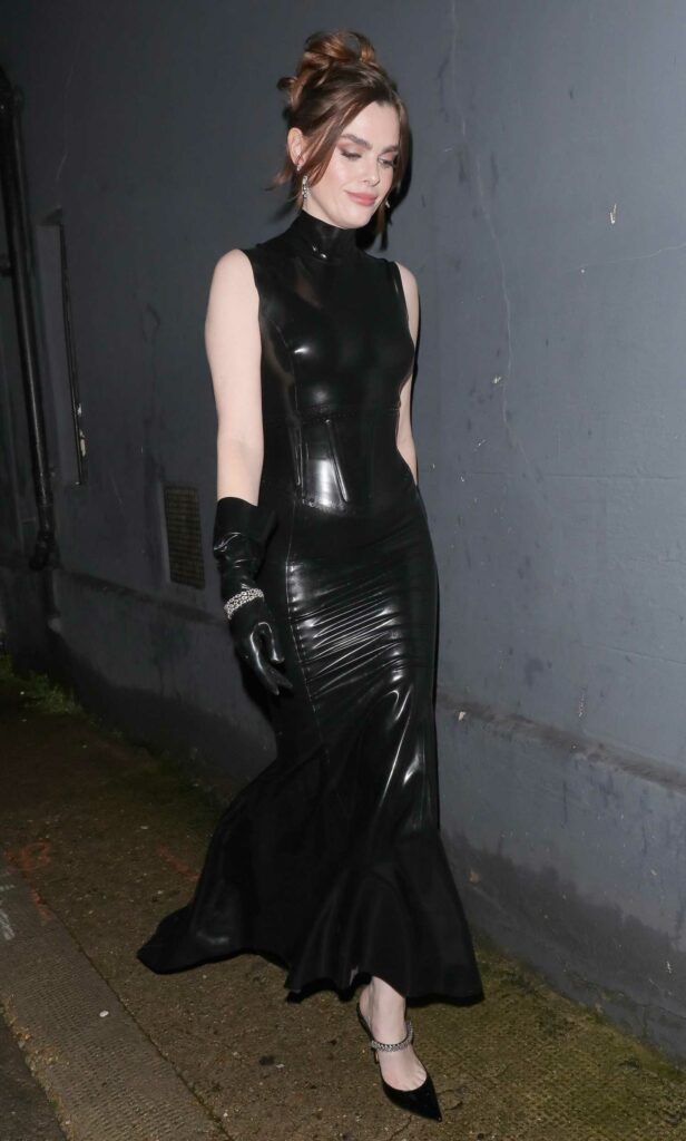 Charli Howard in a Black Leather Dress