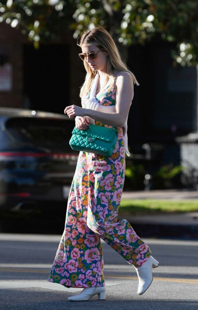 Emma Roberts in a Floral Jumpsuit