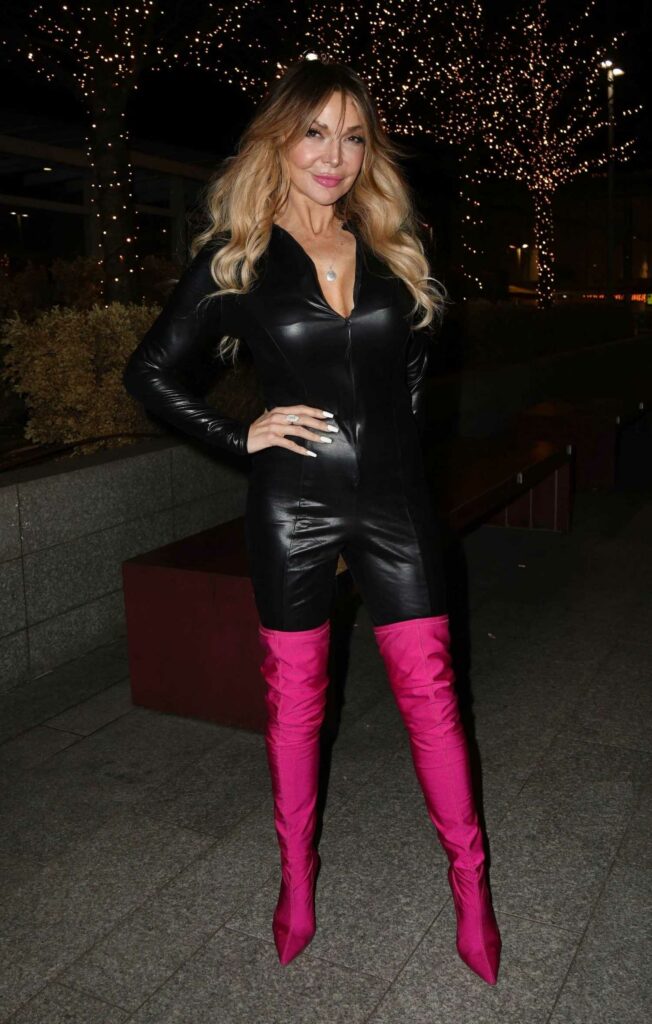 Lizzie Cundy in a Pink Thight High Boots