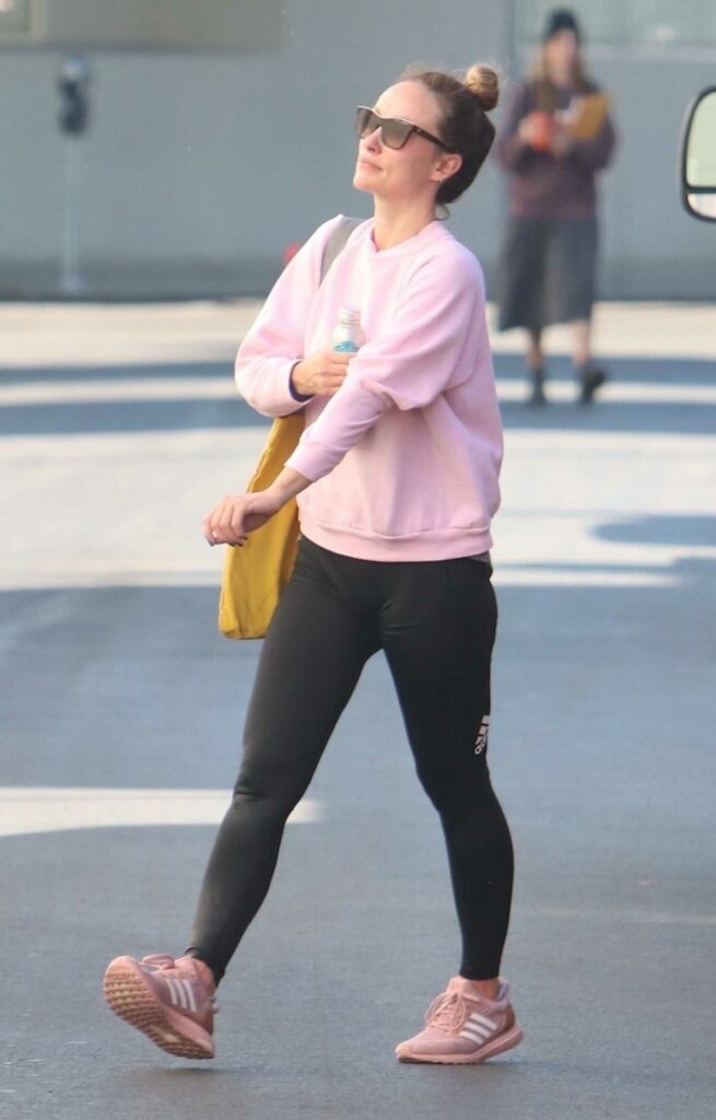 Olivia Wilde in a Pink Sweatshirt