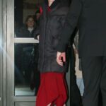 Betty Gilpin in a Red Dress Steps Out from Her Hotel in New York