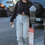Emma Krokdal in a Black Short Cardigan Was Seen Out with Dolph Lundgren in Beverly Hills