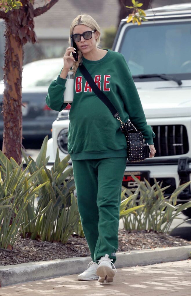 Heather Rae Young in a Green Sweatsuit