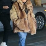 Jennifer Lopez in a Yellow Boots Getting Her Christmas Shopping Done at American Rag in Los Angeles