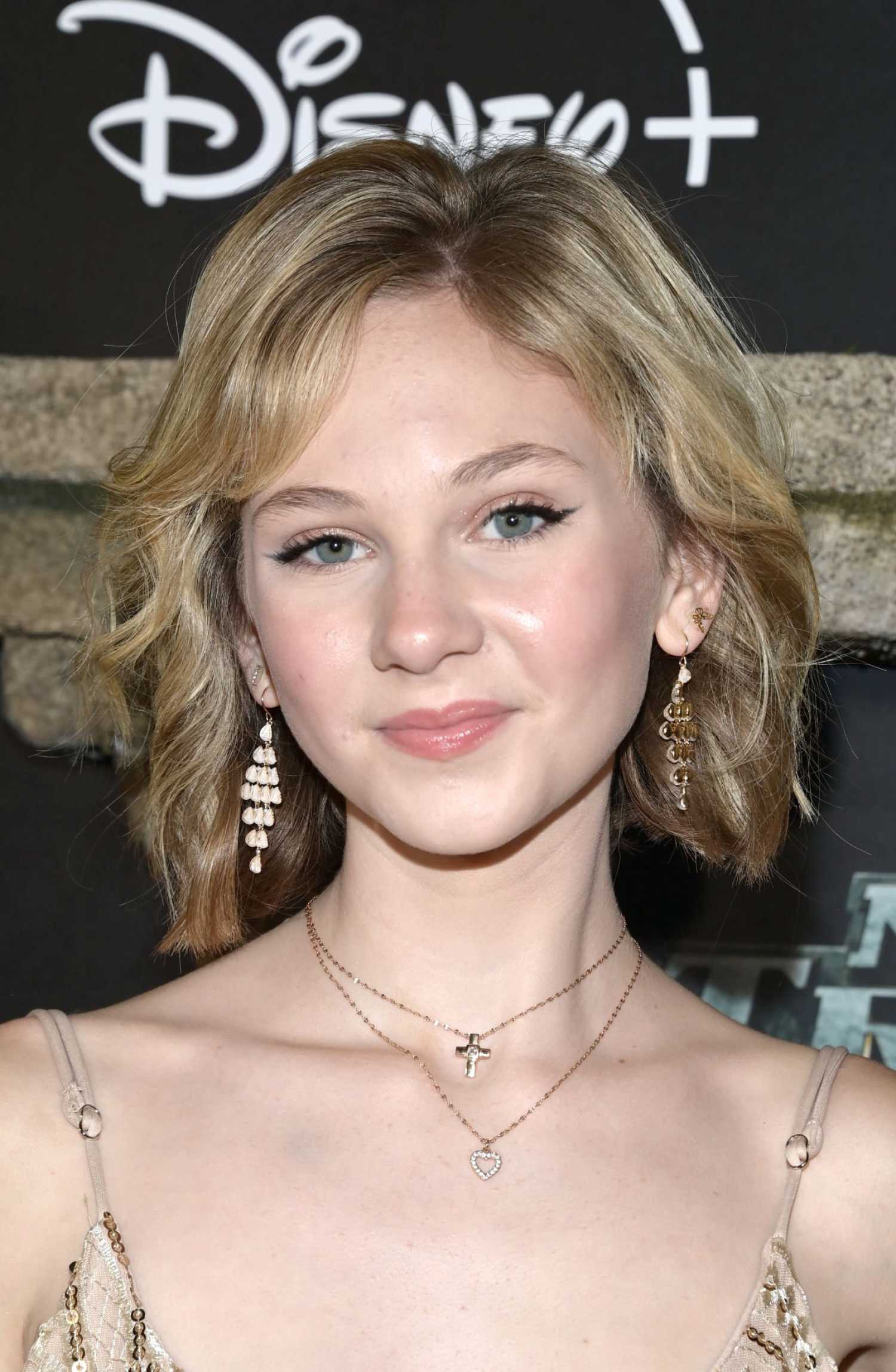 Lily Brooks O’Briant Attends the National Treasure: Edge of History Red Carpet at El Capitan