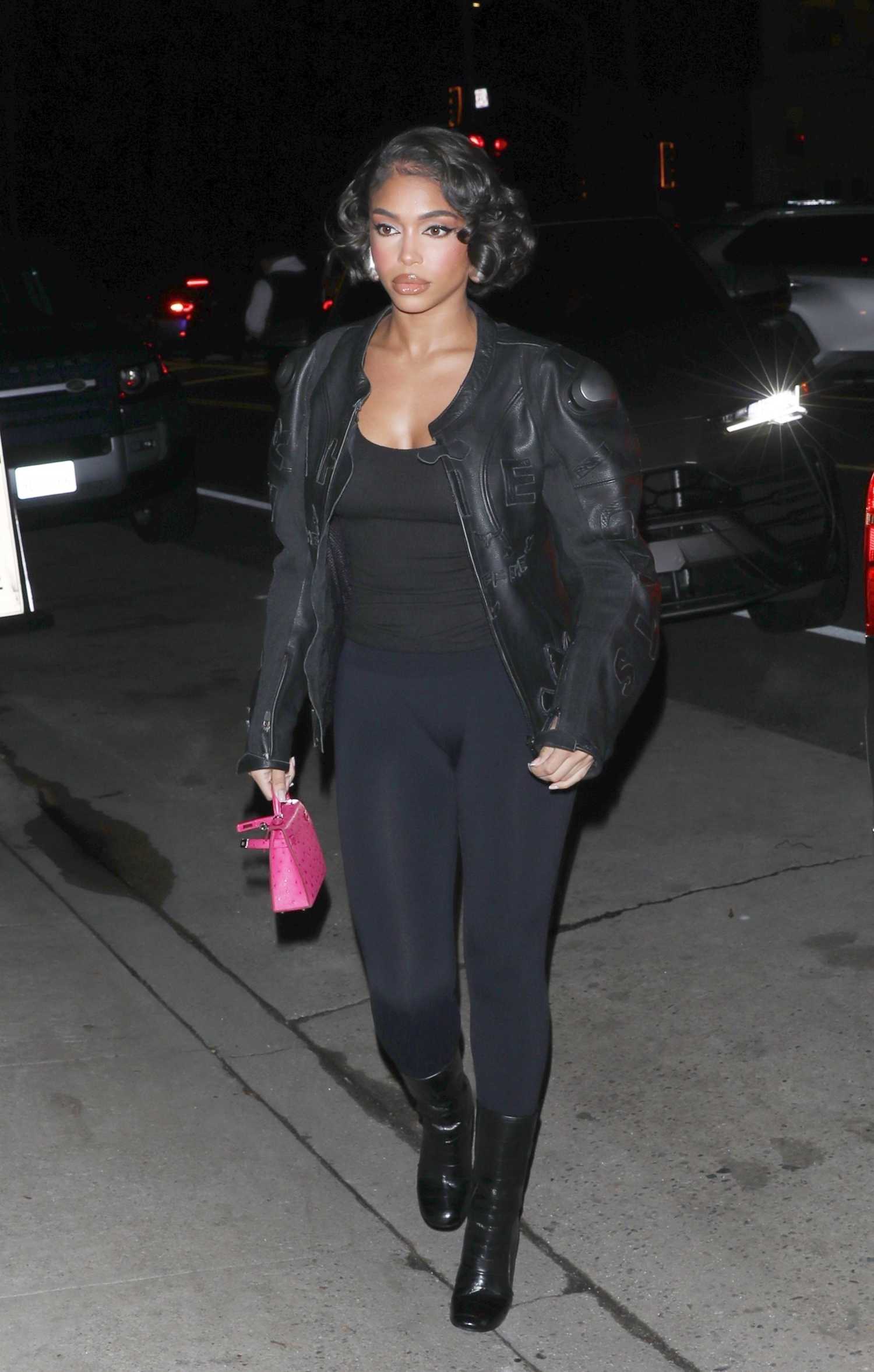 Lori Harvey in a Black Leather Jacket Arrives to Italian Restaurant ...