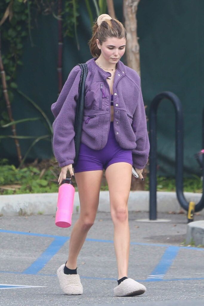 Olivia Jade in a Purple Spandex Shorts