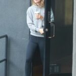 Olivia Wilde in a Green Cap Steps Out for a Moning Cup of Coffee in Los Feliz
